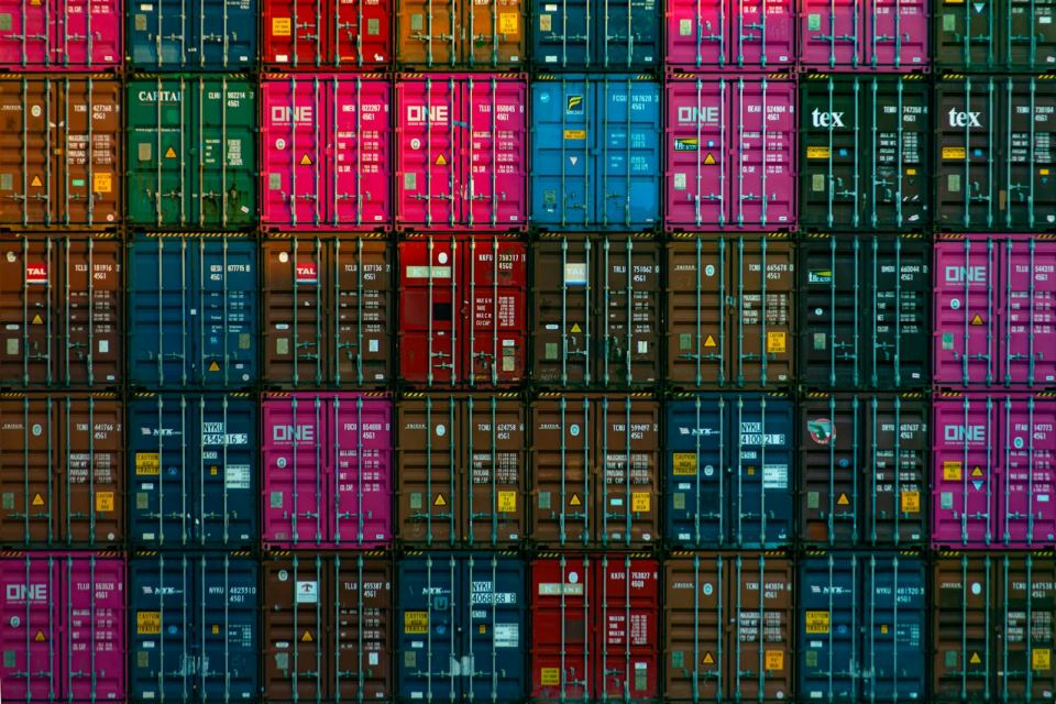 Containers stacked eight high across a terminal yard